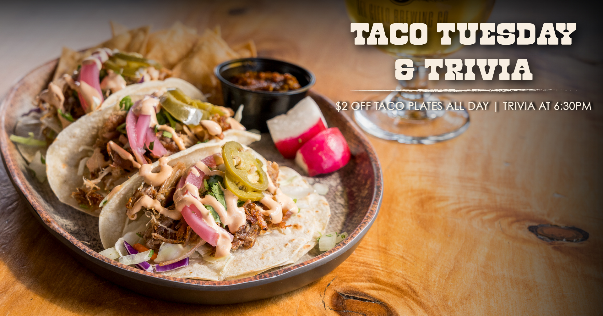 taco tuesday $2 off taco plates + trivia at 6:30PM